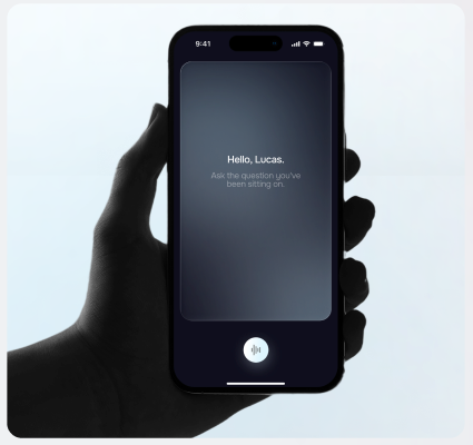 A hand holding a phone showing the Ask Arlee greeting, 'Hello, Lucas — ask the question you've been sitting on'